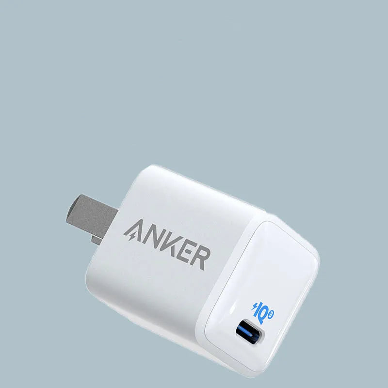 White 18W fast travel charger with UK plug and USB interface for mobile phones