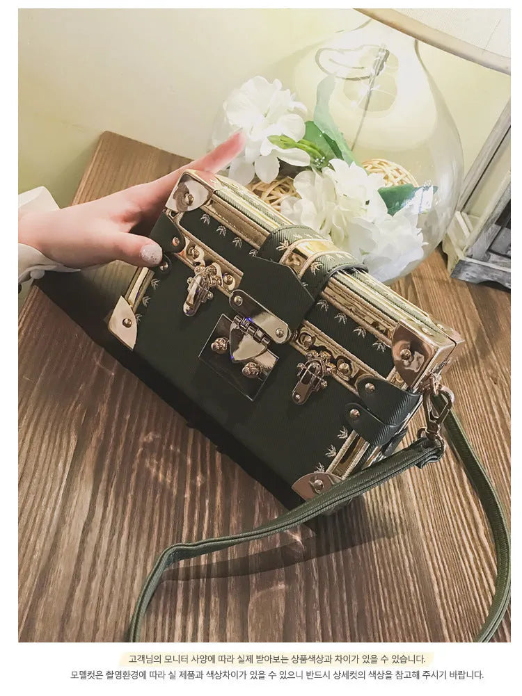 Hard PU leather women's shoulder bag with flap design and crossbody strap in black or green