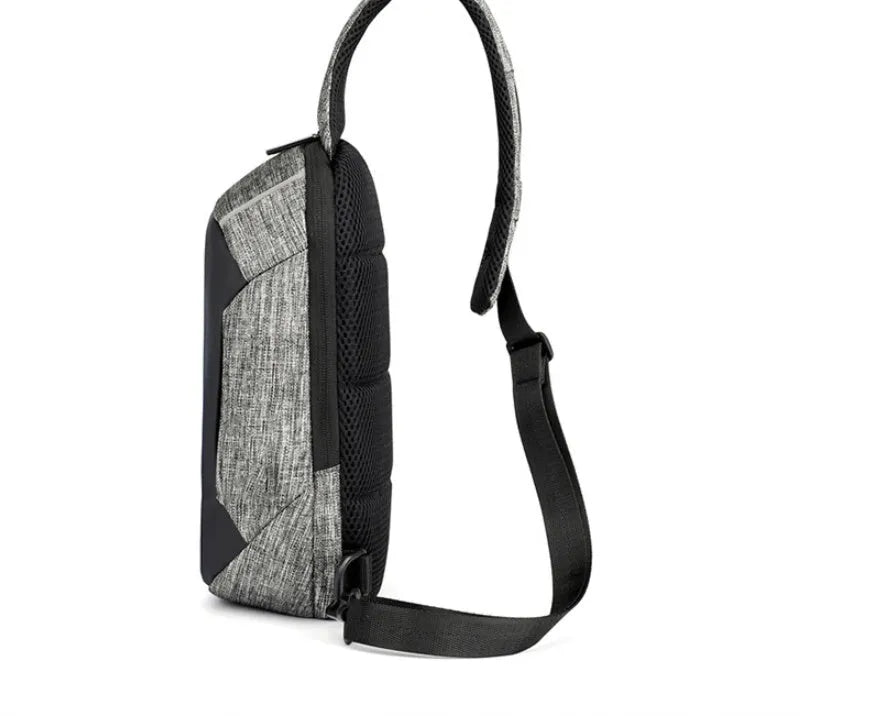 Dark blue Oxford cloth waterproof chest bag with zipper and adjustable strap, showing internal mobile phone pouch.