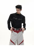 Man wearing a black slim fit long sleeve ice-feel top made from polyester and spandex blend.