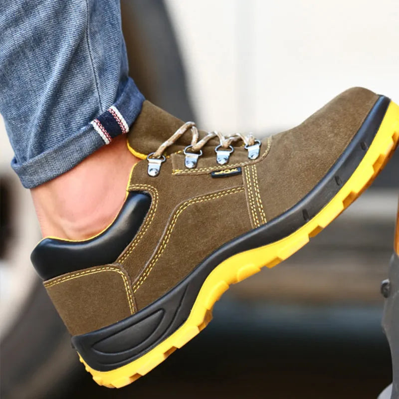 Bronze cow suede unisex safety work boots with a steel toe cap and patterned non-slip sole.