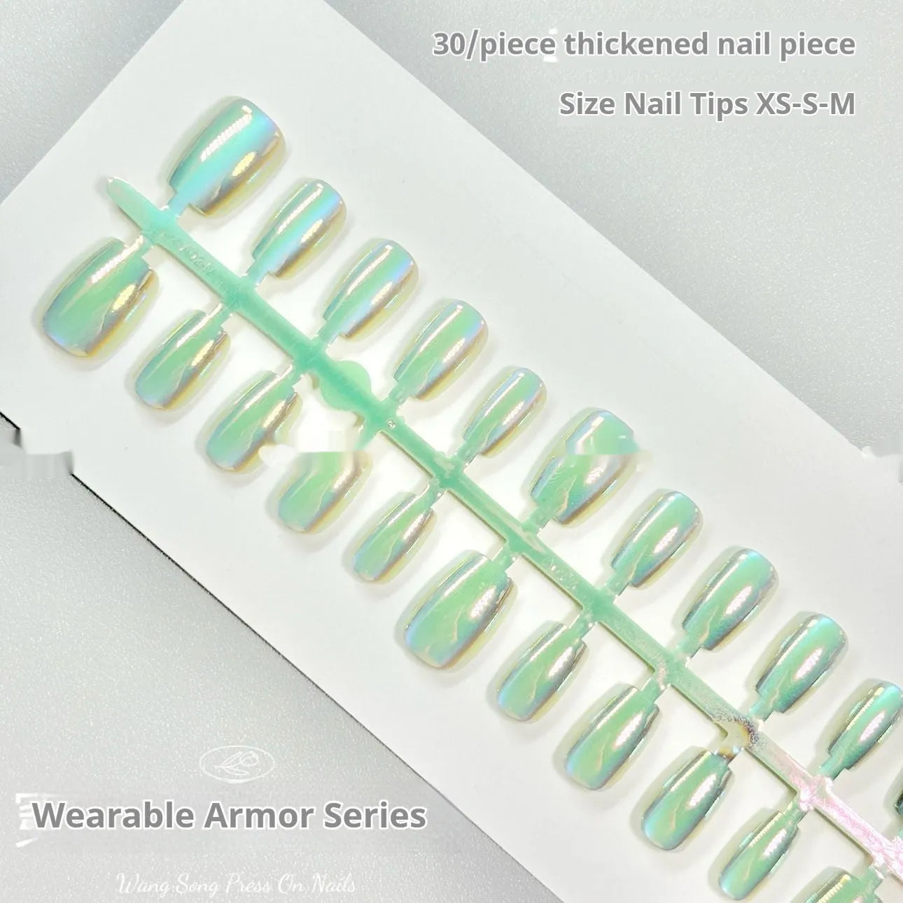 Set of electroplated Cat's Eye false nails with Aurora armour style in short ladder almond shape.