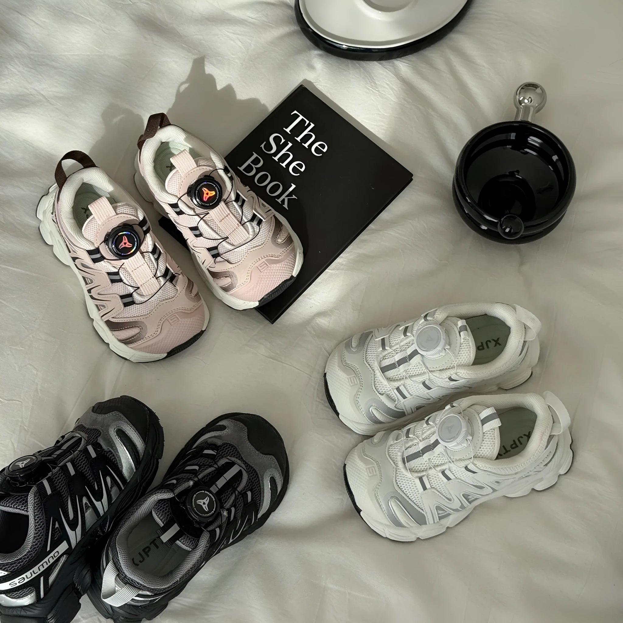 Girls' casual shoes with PU leather mesh upper in black, beige or pink colours on solid background