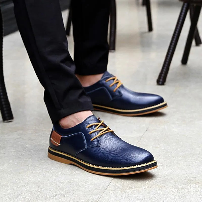 Large size 48 men's British style leather shoes in black with microfiber upper and rubber sole