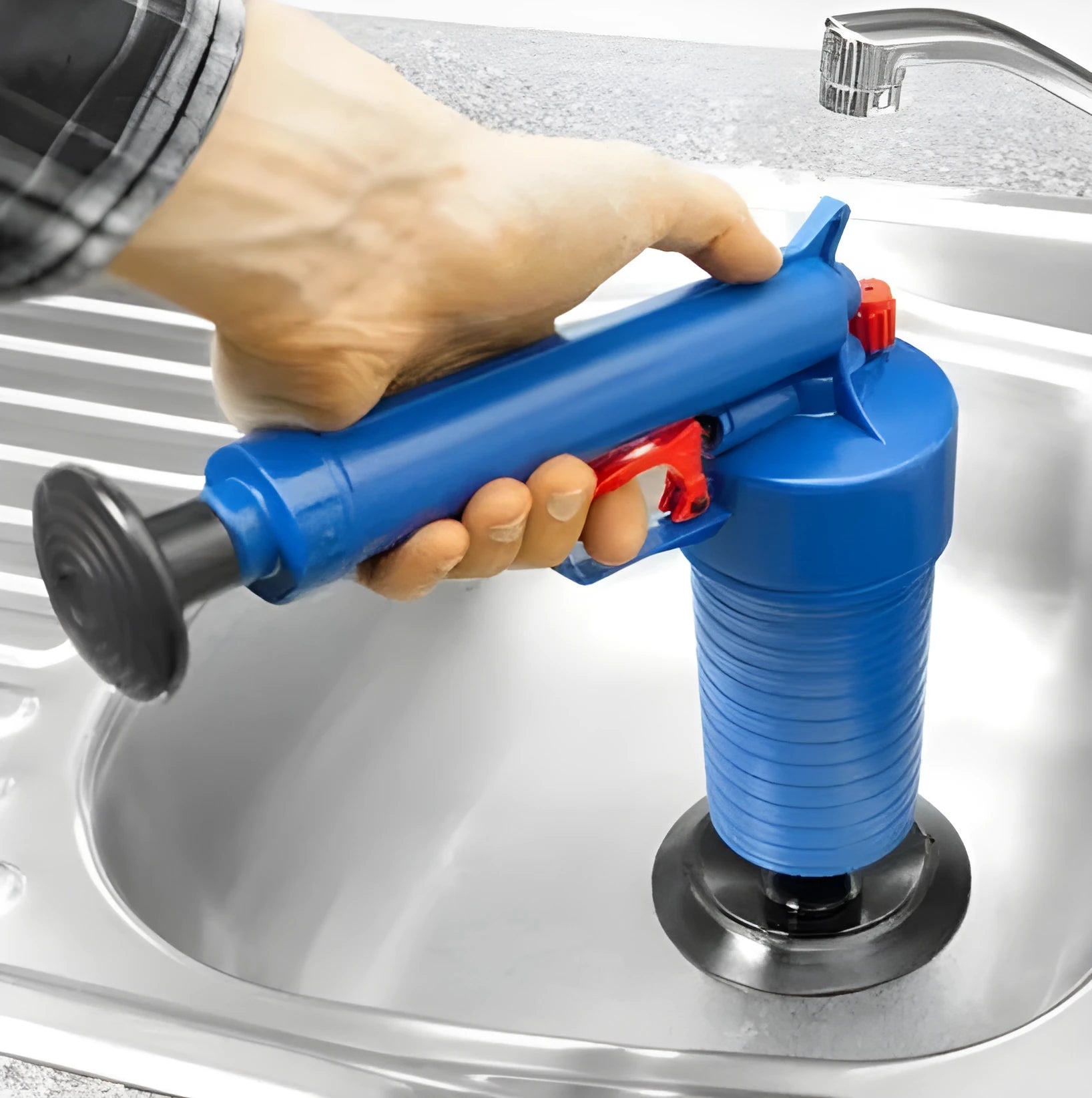Plastic air power drain blaster gun with handle and four different-sized suction cup adaptors for clearing pipe blockages.