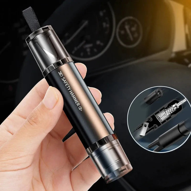 Black and red aluminium alloy car emergency hammer with tungsten steel tip and seat belt cutter on its mounting base.