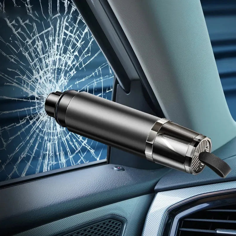 Black and red aluminium alloy car emergency hammer with tungsten steel tip and seat belt cutter on its mounting base.