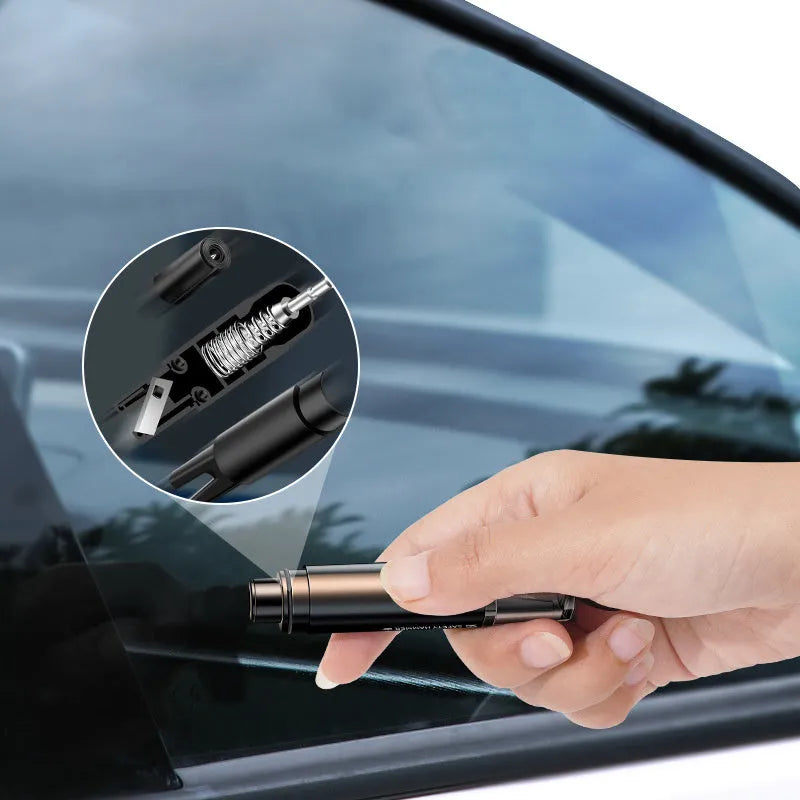 Black and red aluminium alloy car emergency hammer with tungsten steel tip and seat belt cutter on its mounting base.