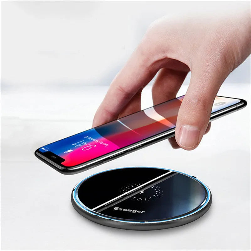 Black wireless charging pad with LED indicator light on aluminium alloy surface