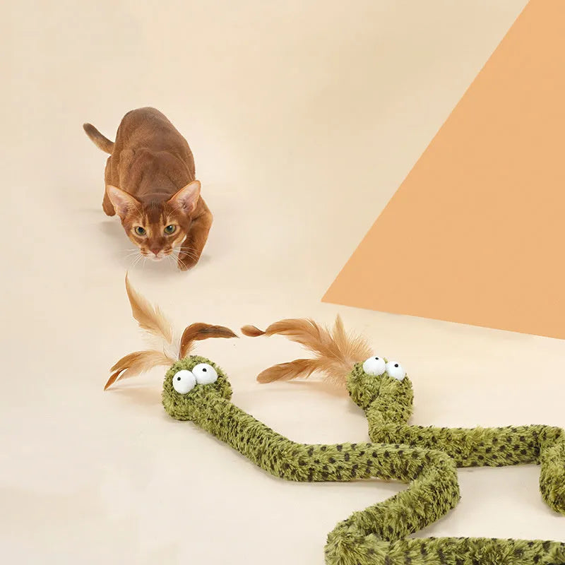 Green cat teasing stick with long pole and four feather toy attachments for interactive play.