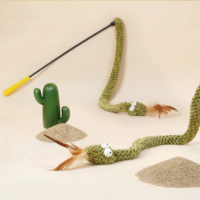 Green cat teasing stick with long pole and four feather toy attachments for interactive play.