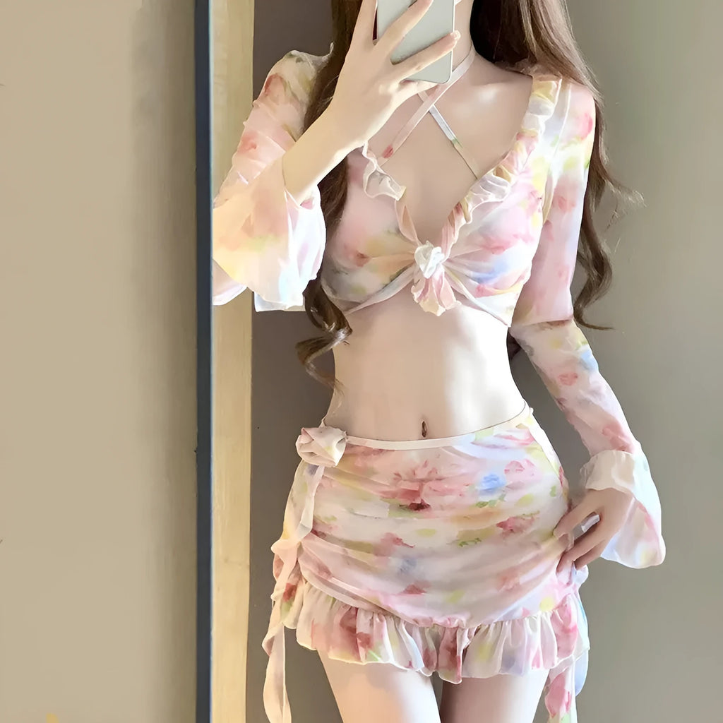 Women's floral bikini swimsuit in cherry blossom pink on a mannequin