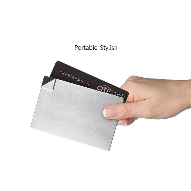 Silver aluminium graphene power bank showing slim 4mm profile with charging ports