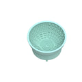 Cyan silicone dog licking mat bowl with suction cup base on a floor