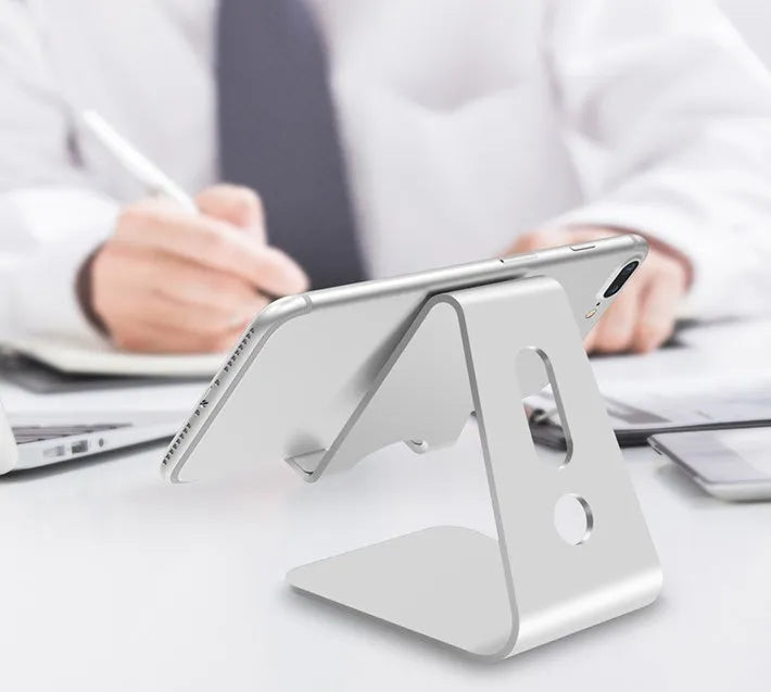 Aluminium universal phone and tablet stand in black, red, rose gold, and silver colour options.