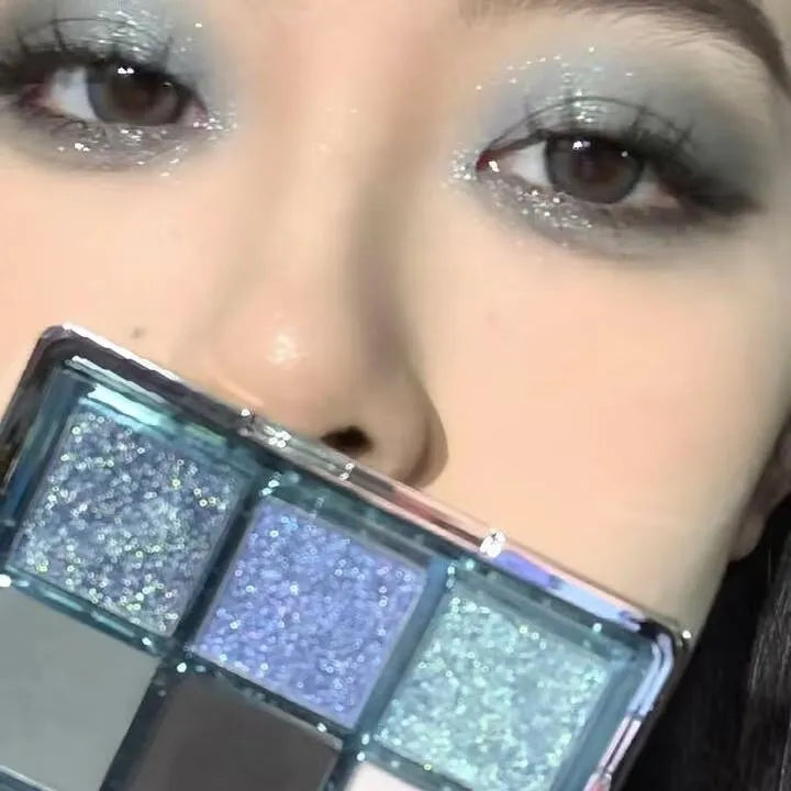 MUGELEEN nine-colour eye shadow palette showing matte, shimmer and diamond debris textures in cool tones