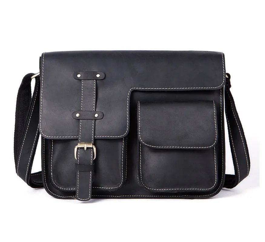Brown leather vintage messenger bag with a flap closure and adjustable crossbody strap.