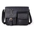 Brown leather vintage messenger bag with a flap closure and adjustable crossbody strap.