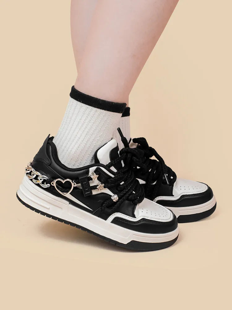 Women's black lace-up platform sneakers with microfiber upper and rubber sole