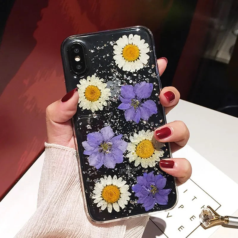 Clear iPhone case with dried flowers in epoxy resin back panel, soft TPU protective cover