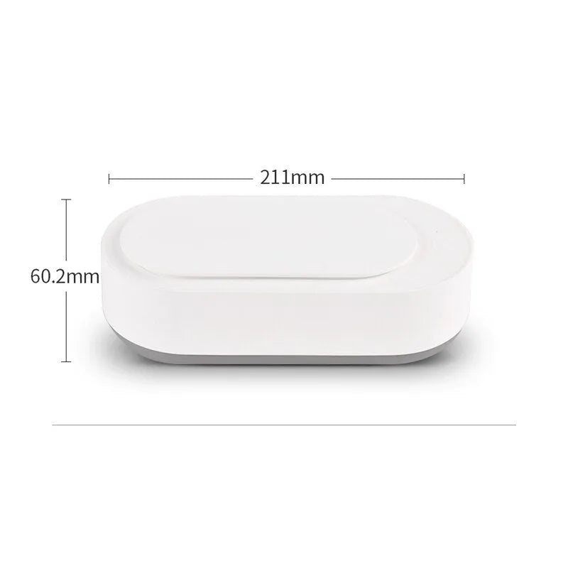 White portable ultrasonic cleaner with stainless steel tank and touch button.