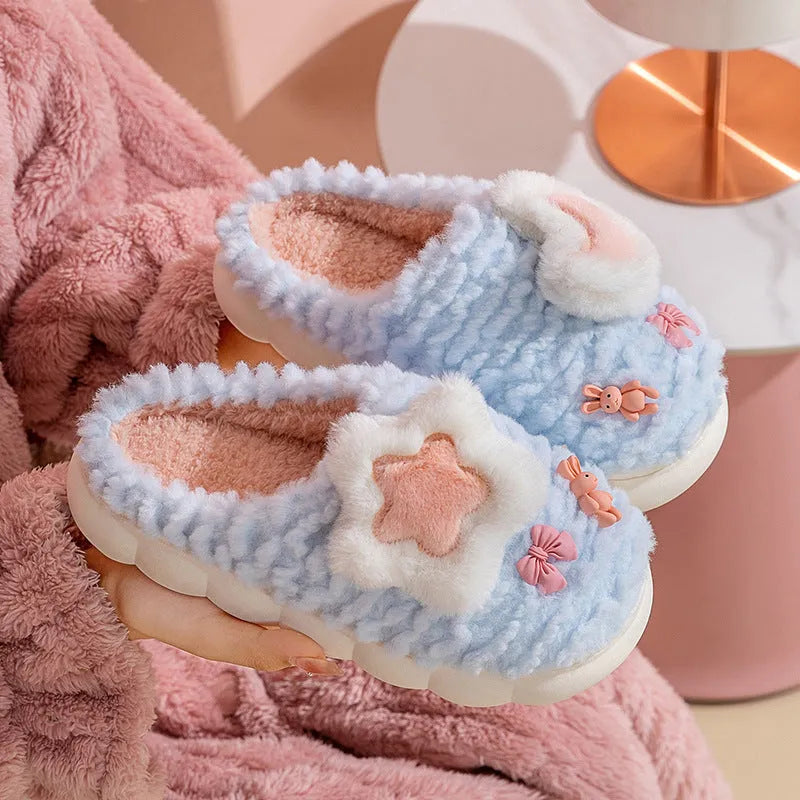 Light blue cartoon animal pattern women's fleece-lined slippers with round toe and PVC sole.
