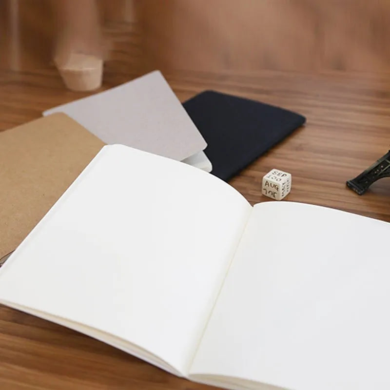 Retro plain graffiti book with blank pages, shown with a black paper cover.