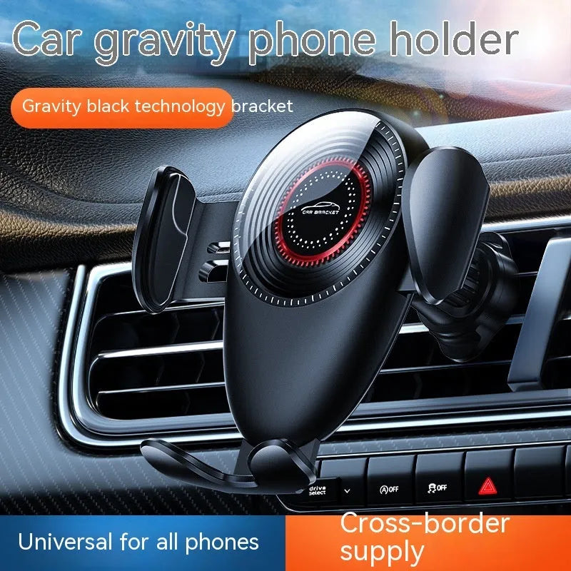 Black universal car phone bracket mounted on car air vent holding mobile phone
