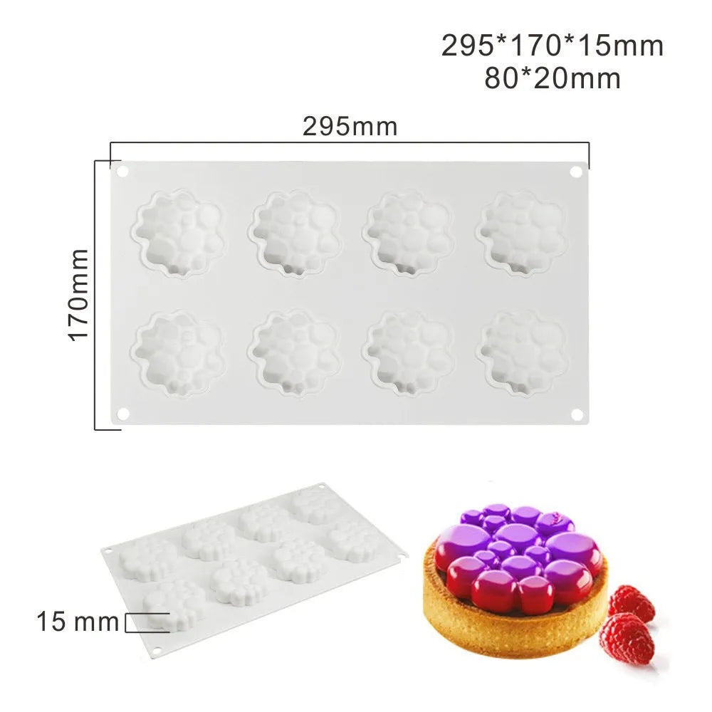 Round silicone baking mould with eight raised bubble cavities for tower cakes.