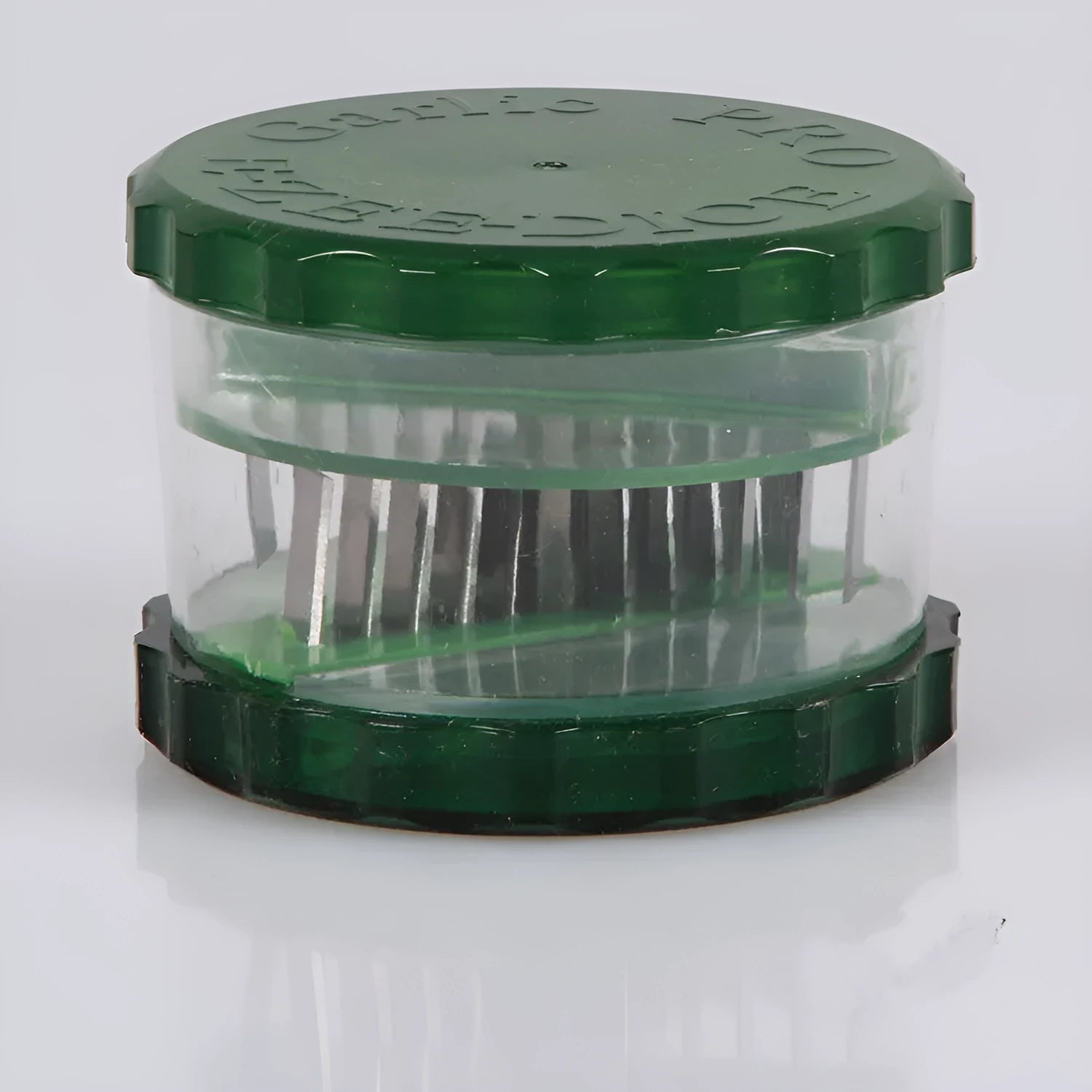 Green transparent PP garlic peeler kitchen gadget measuring 8.5cm wide