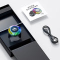 Small black cube voice control polar light Bluetooth LED atmosphere lamp on a table.