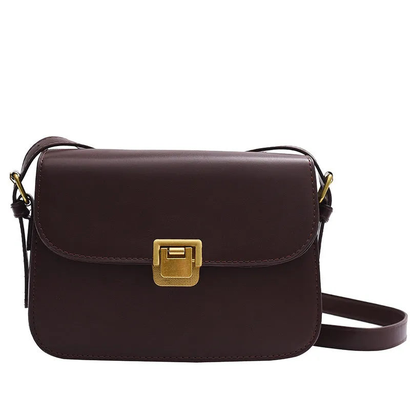 Soft PU leather women's small square shoulder bag in black with one-shoulder underarm carry design