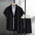 Men's casual short sleeve shirt and matching shorts set in black, laid flat.