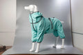 Dog wearing red polyester shell jacket with cotton-padded interior for warmth