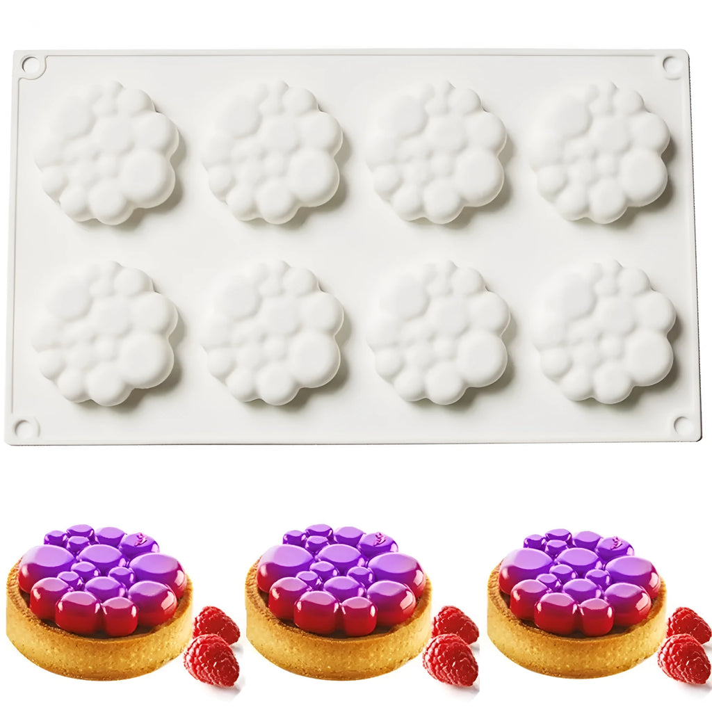 Round silicone baking mould with eight raised bubble cavities for tower cakes.