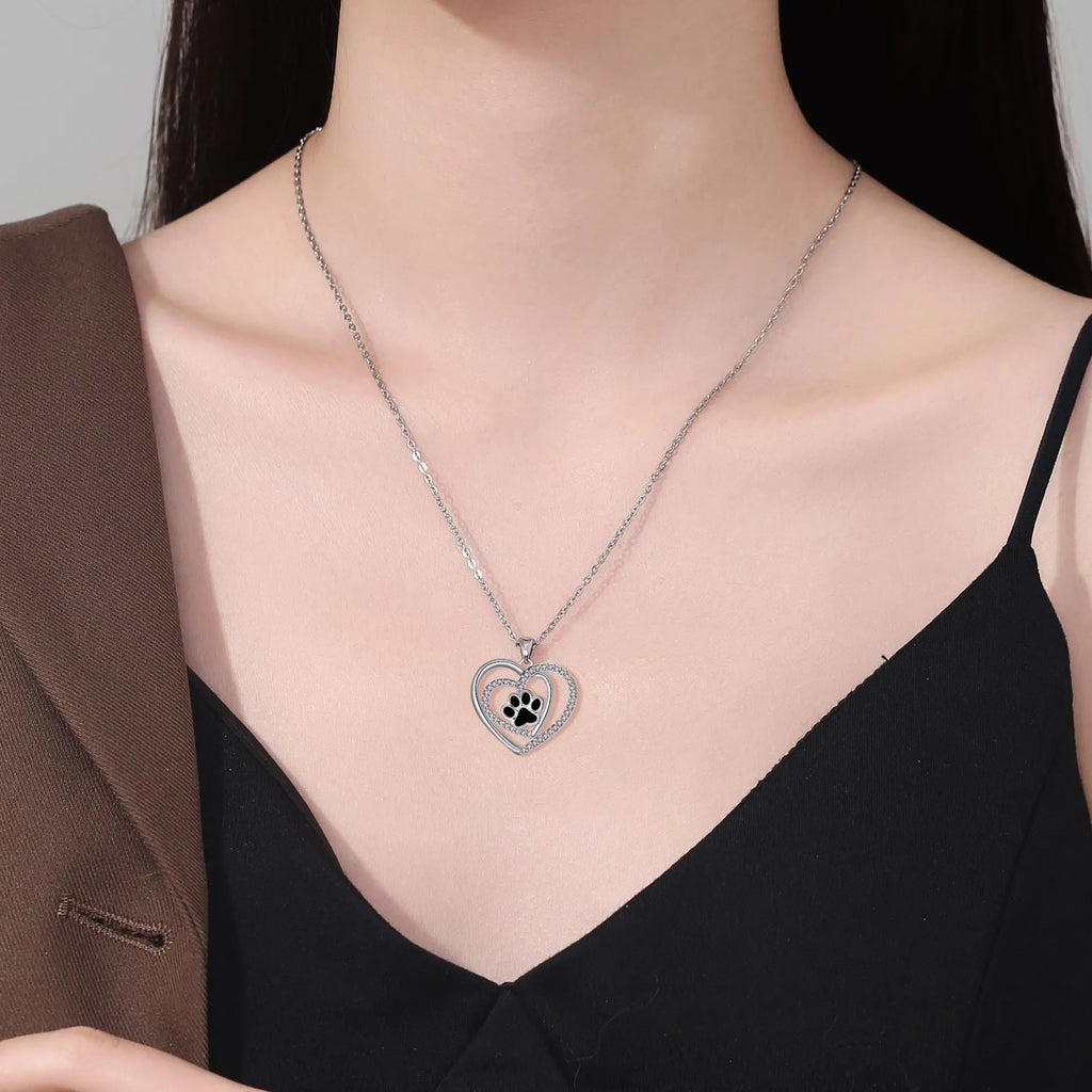 Women's dog paw print heart necklace on a cross chain, electroplated copper pendant.