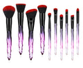 Ten crystal-handle foundation brushes with artificial fibre bristles in black, blue, red, and yellow colours.