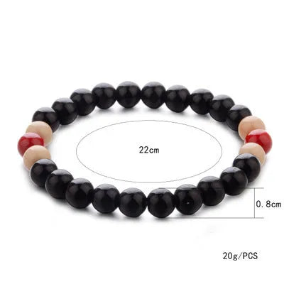 Natural stone beaded bracelet with lava stones for essential oils, ethnic unisex design.