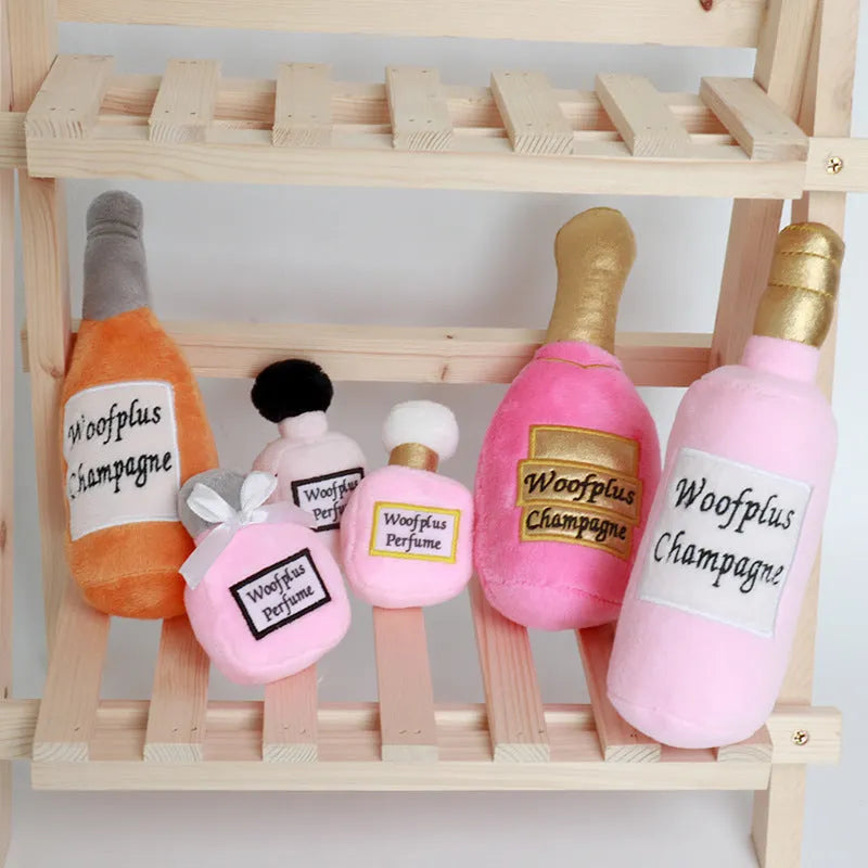 Plush wine bottle shaped dog toy in assorted colours with soft textile material