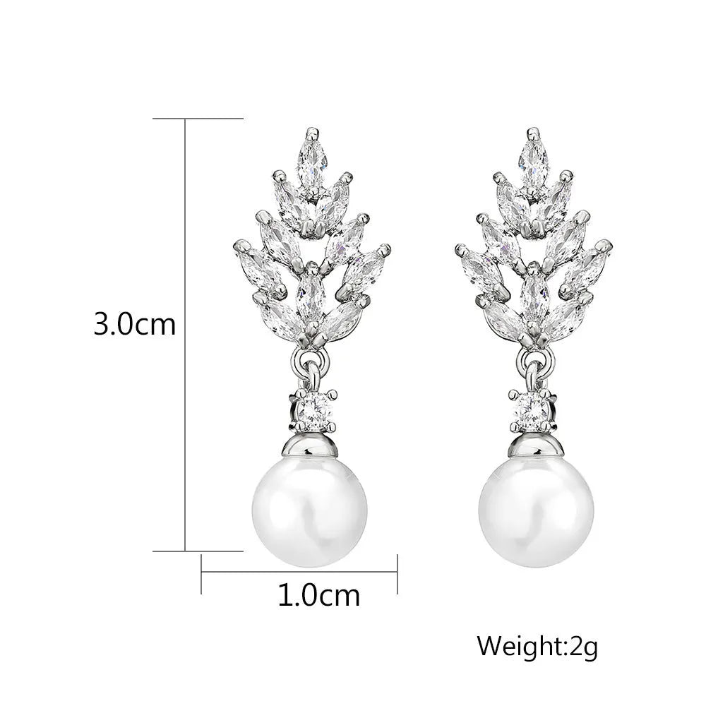 Geometric floral design earrings with micro inlaid zircon, available in white gold, rose gold, and platinum plating.