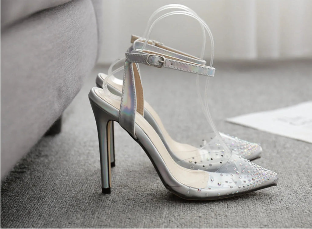 Women's pointed toe sandals with stiletto heels, diamond detail on PVC upper, shown on a size chart.