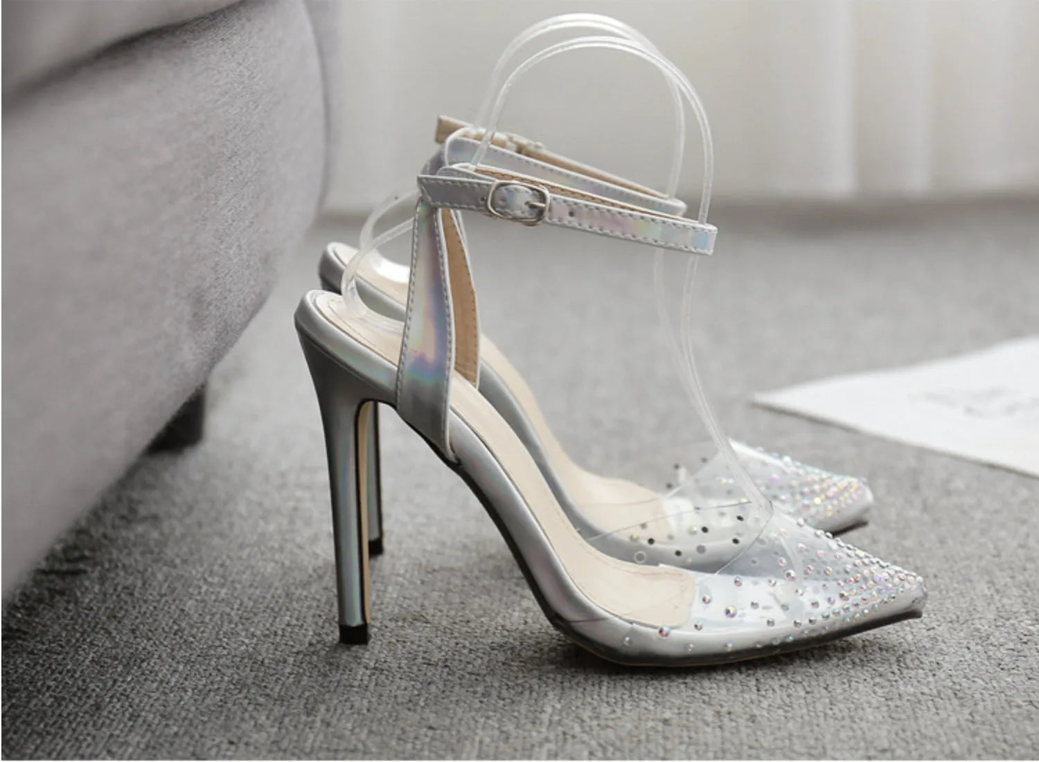 Women's pointed toe sandals with stiletto heels, diamond detail on PVC upper, shown on a size chart.