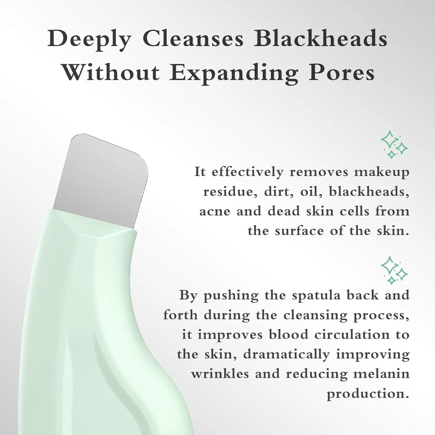 A stainless steel blackhead remover tool with a non-slip handle on a flat surface.