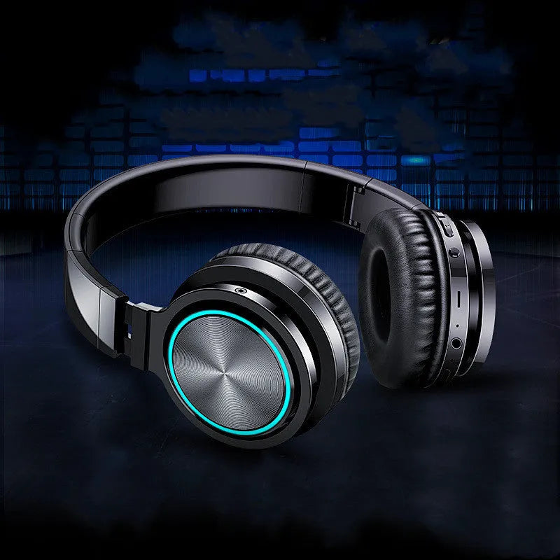 Folding wireless Bluetooth headset in black, black and red, or white and grey colours showing head-mounted design