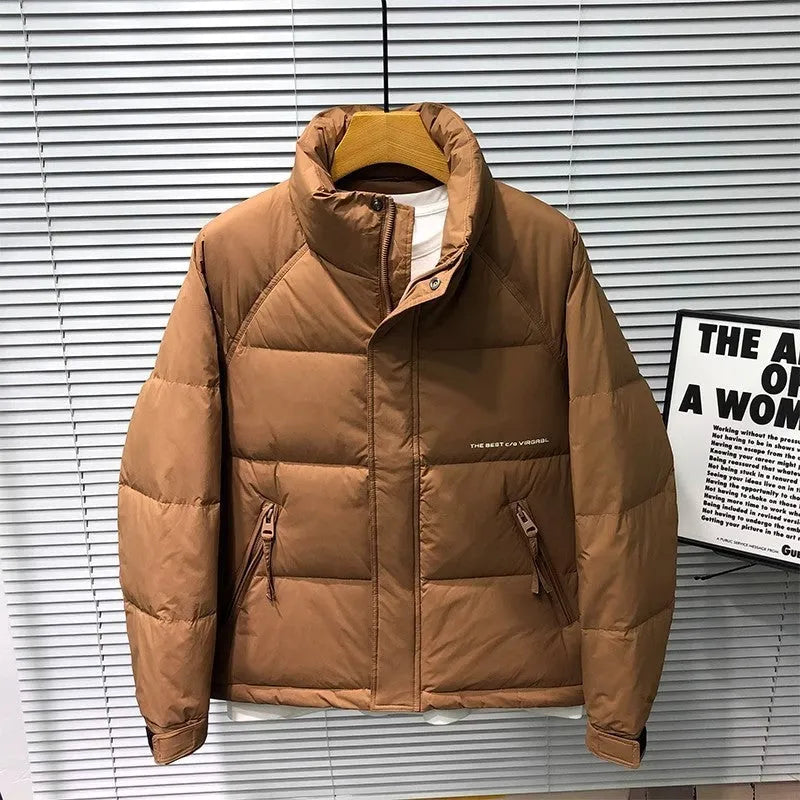 Men's stand collar thick down jacket in solid black colour on a plain background