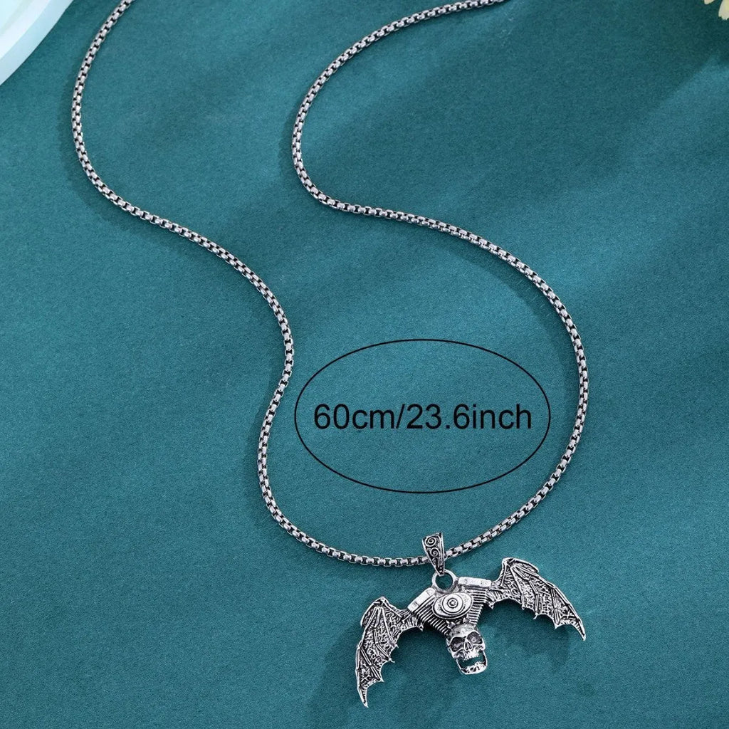 Gothic dark skull alloy necklace with skeleton wing pendant on display