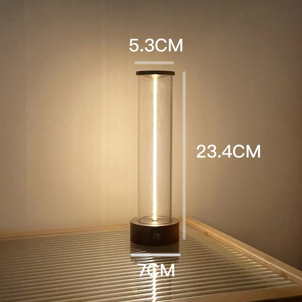 Slim warm white LED light strip with magnetic base for USB charging and attachment to metal surfaces.