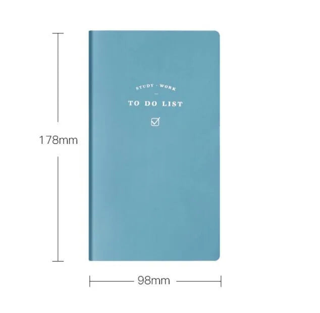 A simple portable todolist notebook in morandi blue with a PU cover, shown next to a pen.