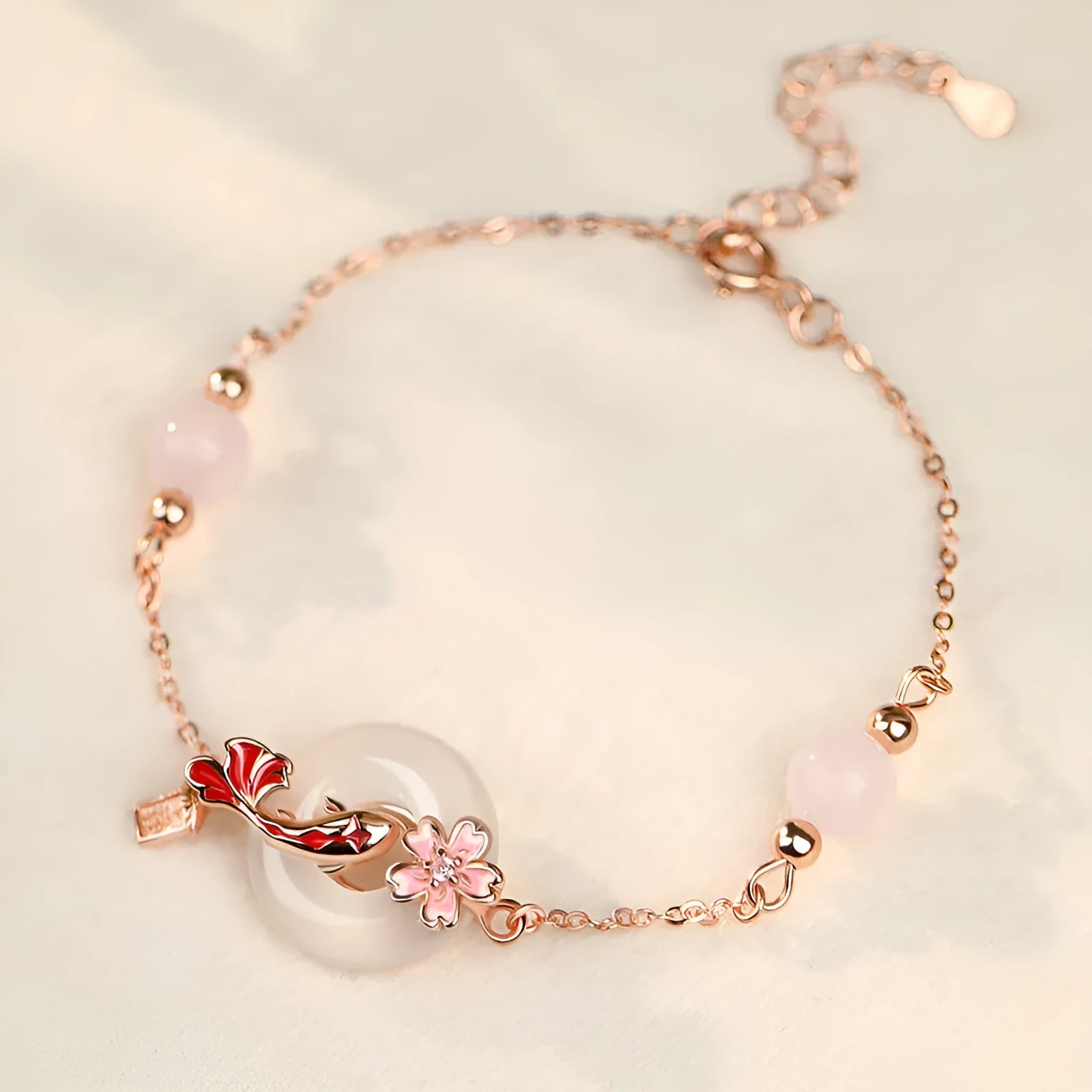 S925 sterling silver bracelet with white chalcedony flower and koi fish design in New Chinese style.