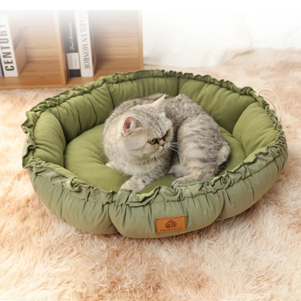 Grey and green reversible donut cat bed for indoor cats with raised sides